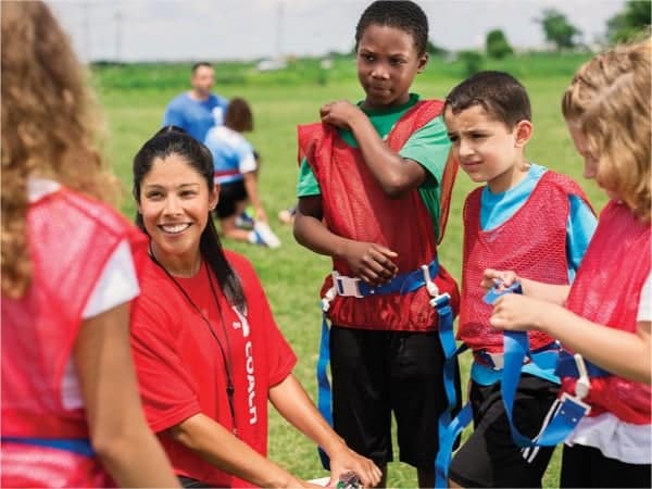 Kids-Playing-Soccer-At-Summer-Sports-Camps